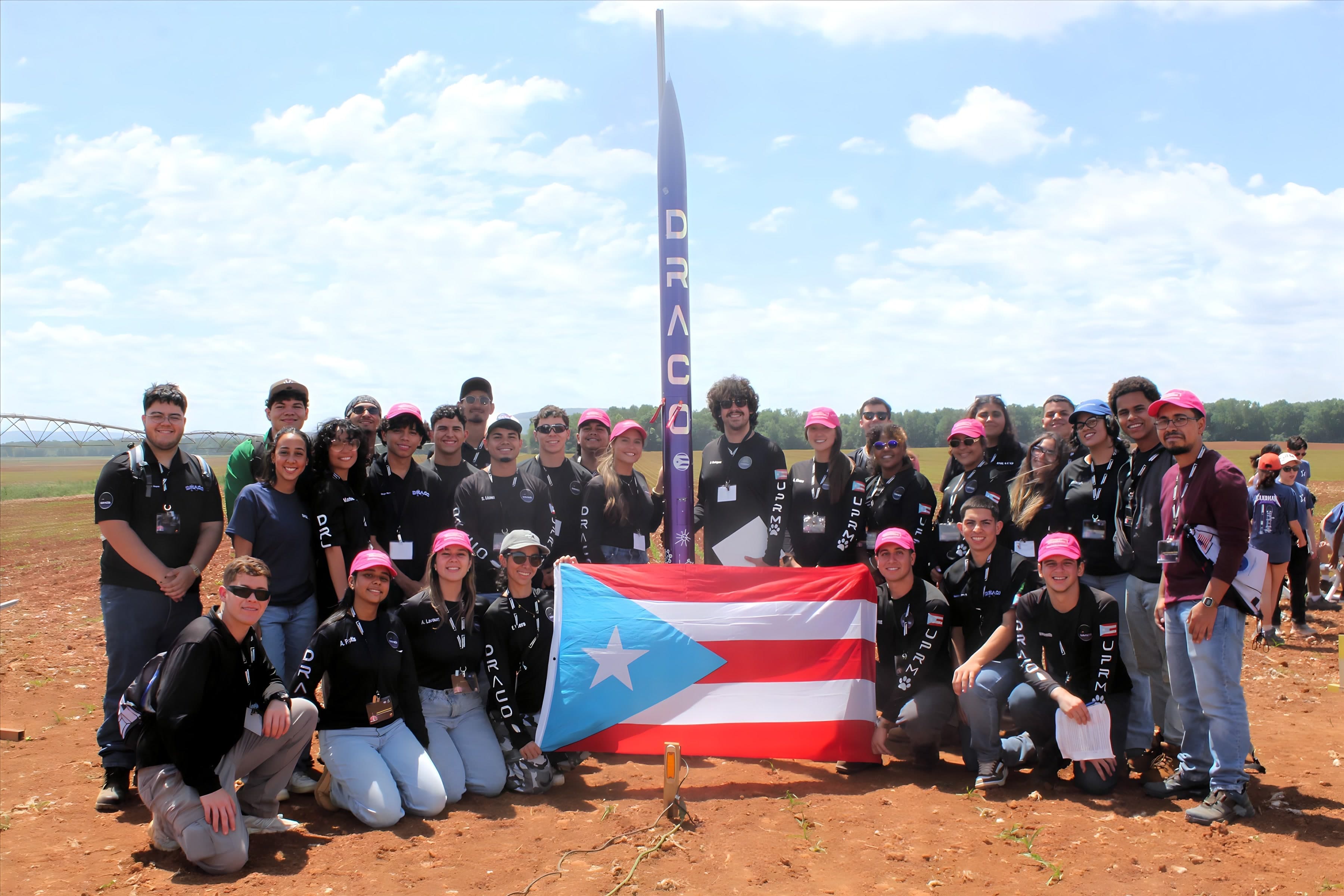 The DRACO Rocketry team with Koeia on launch day at NASA Student Launch