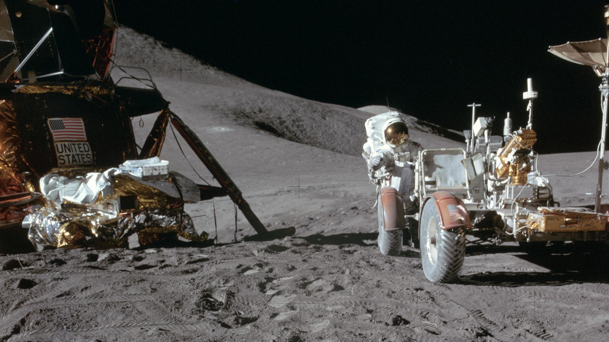 Apollo astronaut with the Lunar Roving Vehicle on the Moon