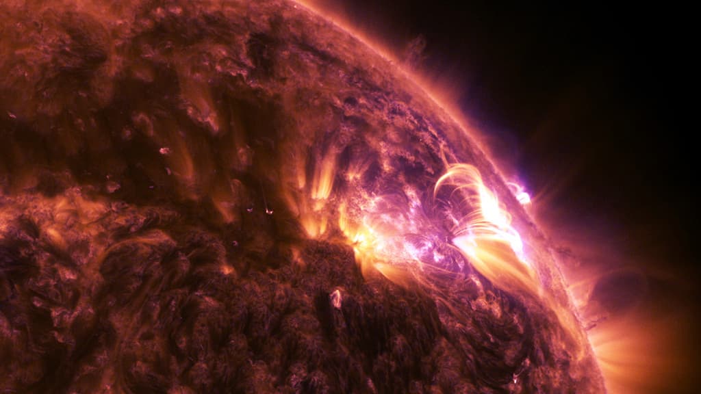 A solar flare erupting from the surface of the sun